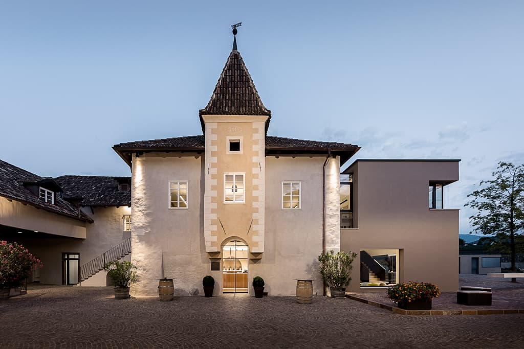 View of the superb estate with the tower of the Cantina Girlan winery.